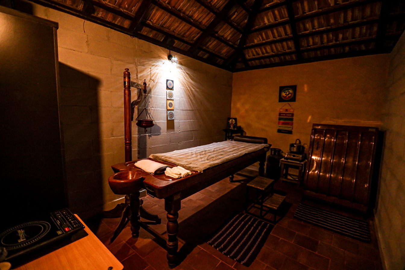 Beautiful High-Quality Ayurveda Treatment Spa Room at Ayurveda Living Village Kerala by Veda5 Wellness